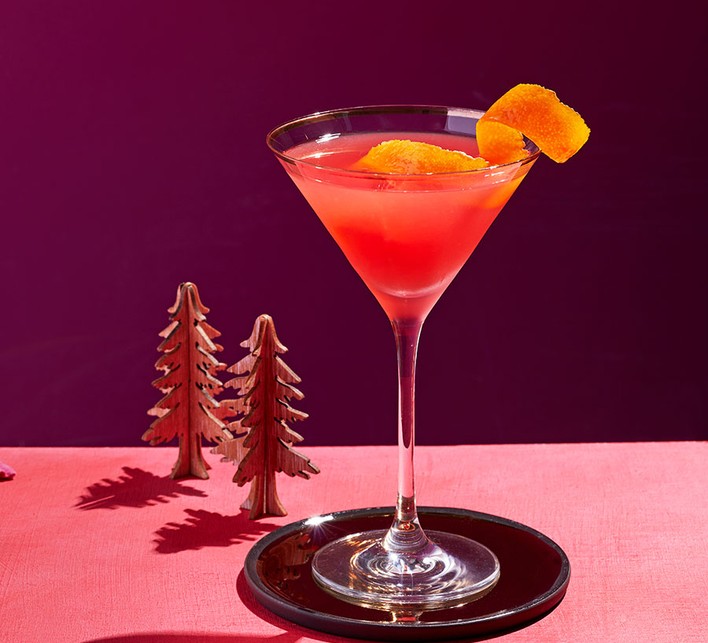 Cosmopolitan cocktail with lime twist garnish