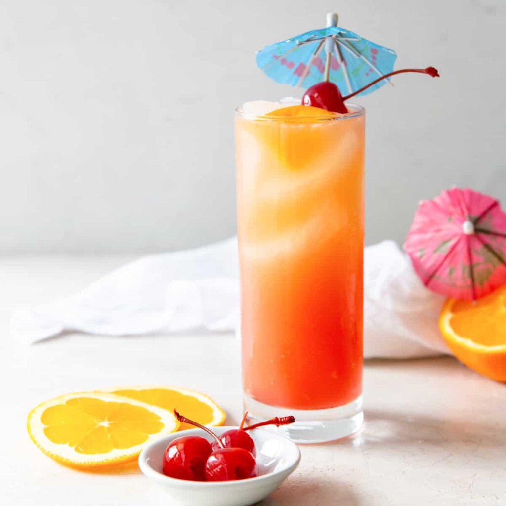 Sex on the Beach cocktail with orange slice garnish