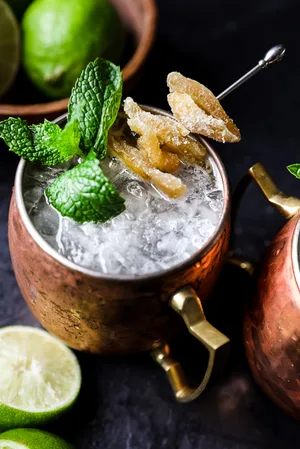 Moscow Mule cocktail served in a copper mug with lime garnish