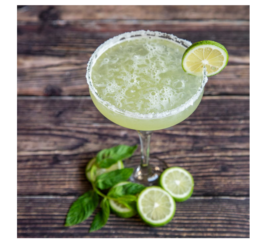 Classic Margarita cocktail with lime and salt rim