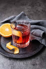 Classic Negroni cocktail in rocks glass with orange twist