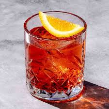Classic Negroni cocktail in rocks glass with orange twist