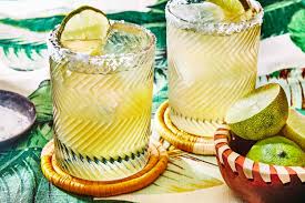 Classic Margarita cocktail with lime and salt rim