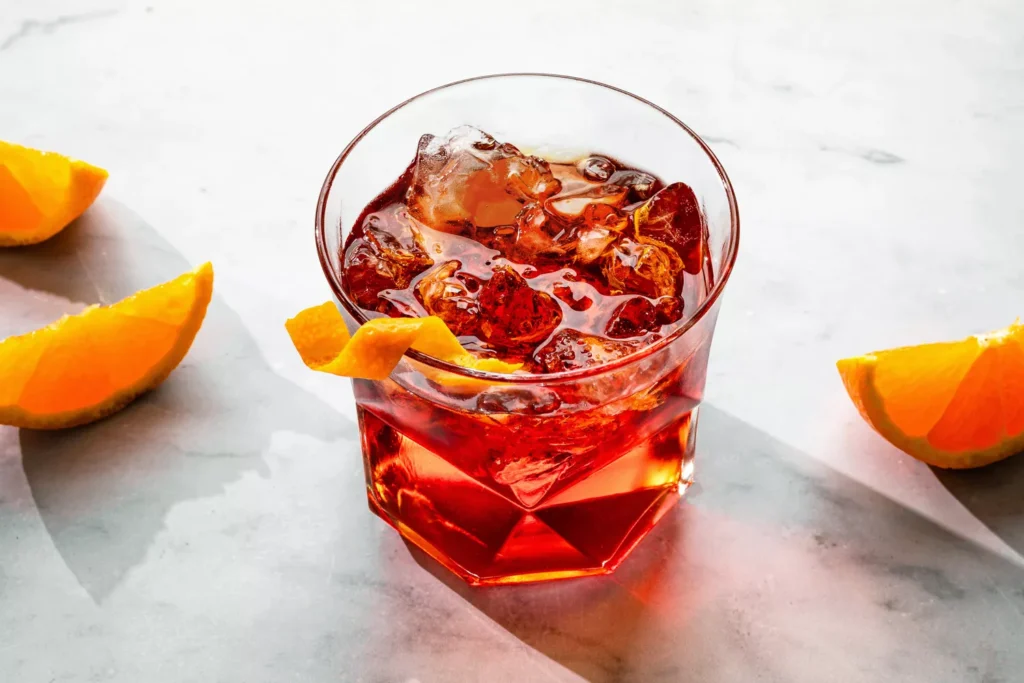 Classic Negroni cocktail in rocks glass with orange twist