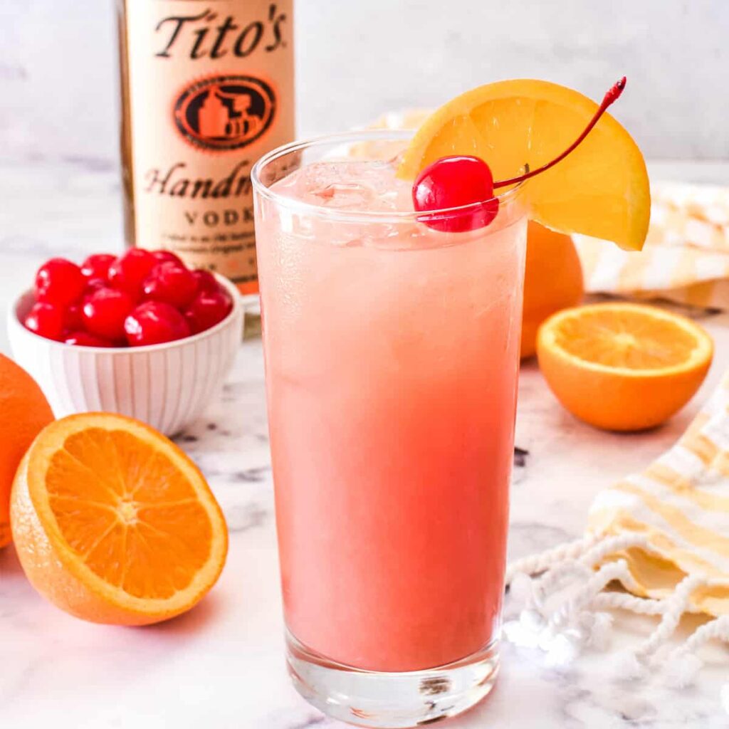 Sex on the Beach cocktail with orange slice garnish