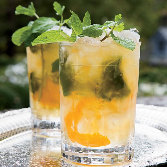mint julep cocktail served in a silver cup with mint garnish