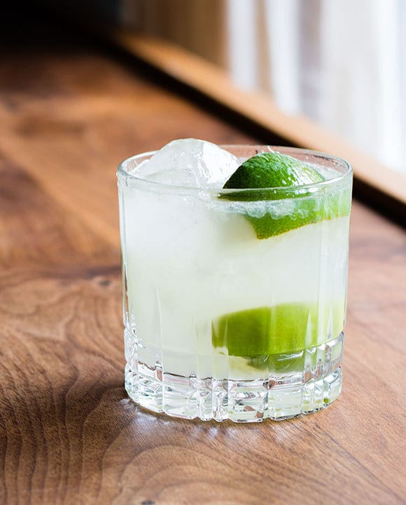 Caipirinha cocktail made with cachaça, lime, and sugar