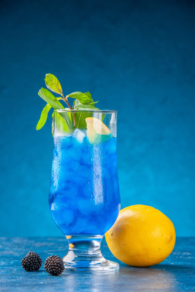 Blue Lagoon cocktail with lemon garnish