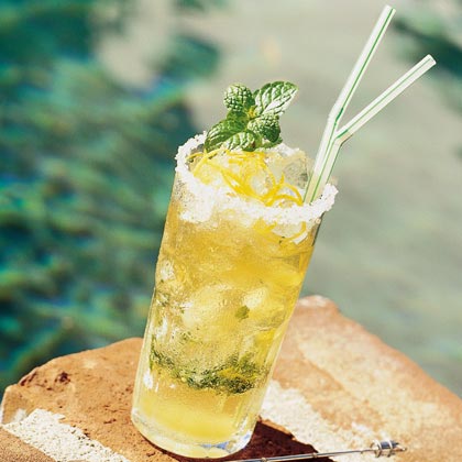 mint julep cocktail served in a silver cup with mint garnish